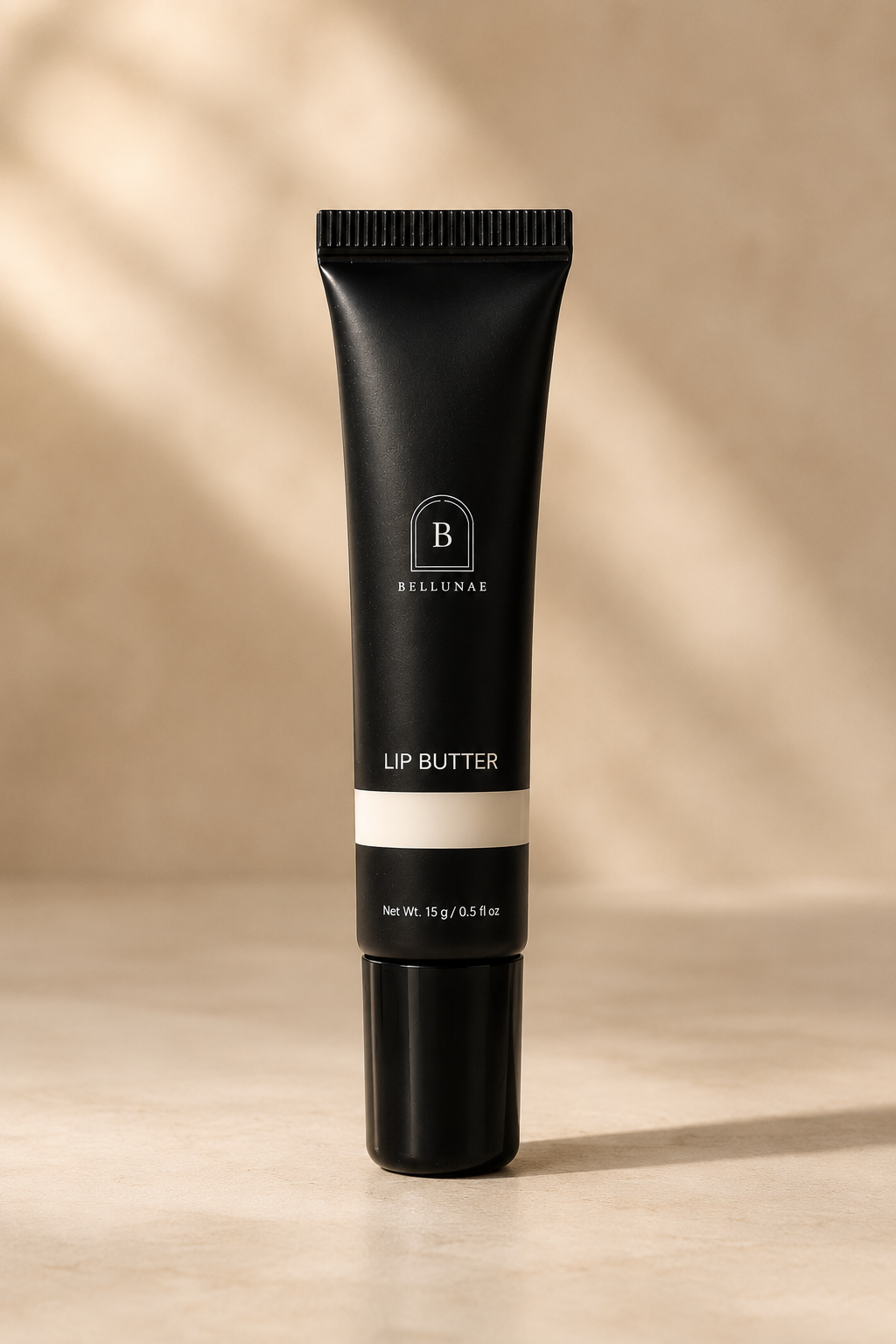 Lip Butter tube on warm stone